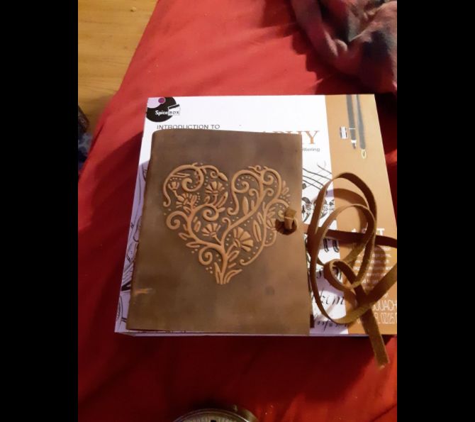 Customer photo review of Vintage Leather Journal with Embossed Heart – Antique Paper