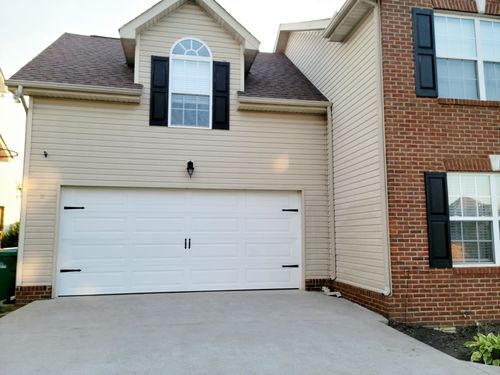 Customer photo review of Decorative Garage Door Hinge and Handle Magnet Accents (6-PC Set)