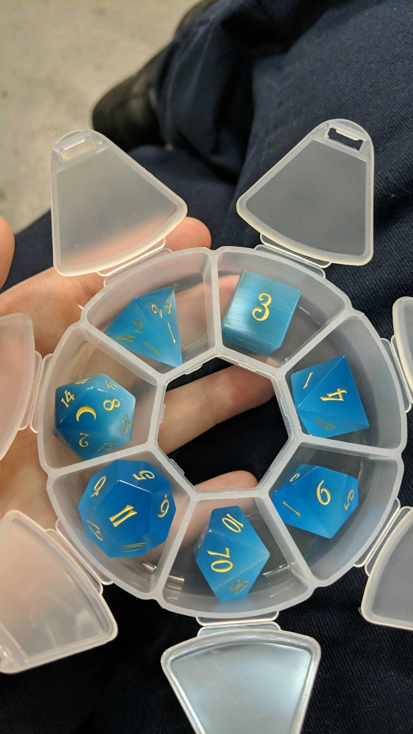 Customer photo review of URWizards Dnd Aquamarine Cat's Eye Gemstone Engraved Dice Set