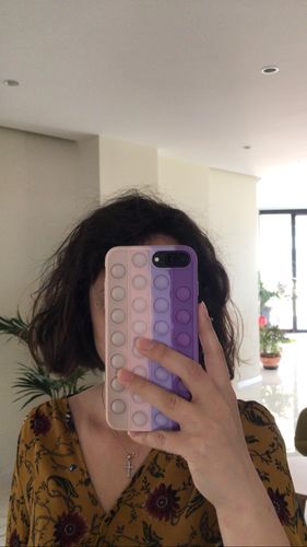 Customer photo review of Stress Reliever Push Pop Bubble Fidget Toy 2 iPhone Case