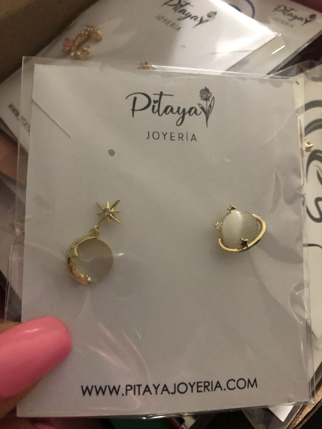 Customer photo review of Aretes de Saturno de Ópalo