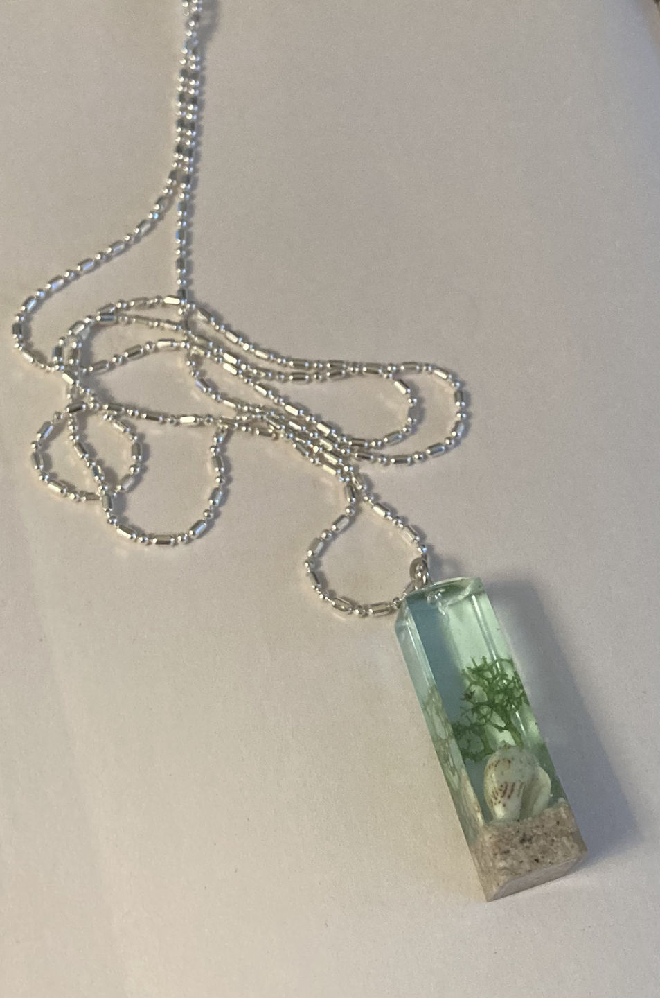 Customer photo review of Deep in the Ocean Pendant with Seaweed and Seashell