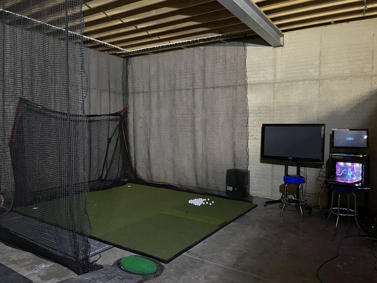 Customer photo review of Fiberbuilt 10'x12' Center-Hitting Combo Golf Mat