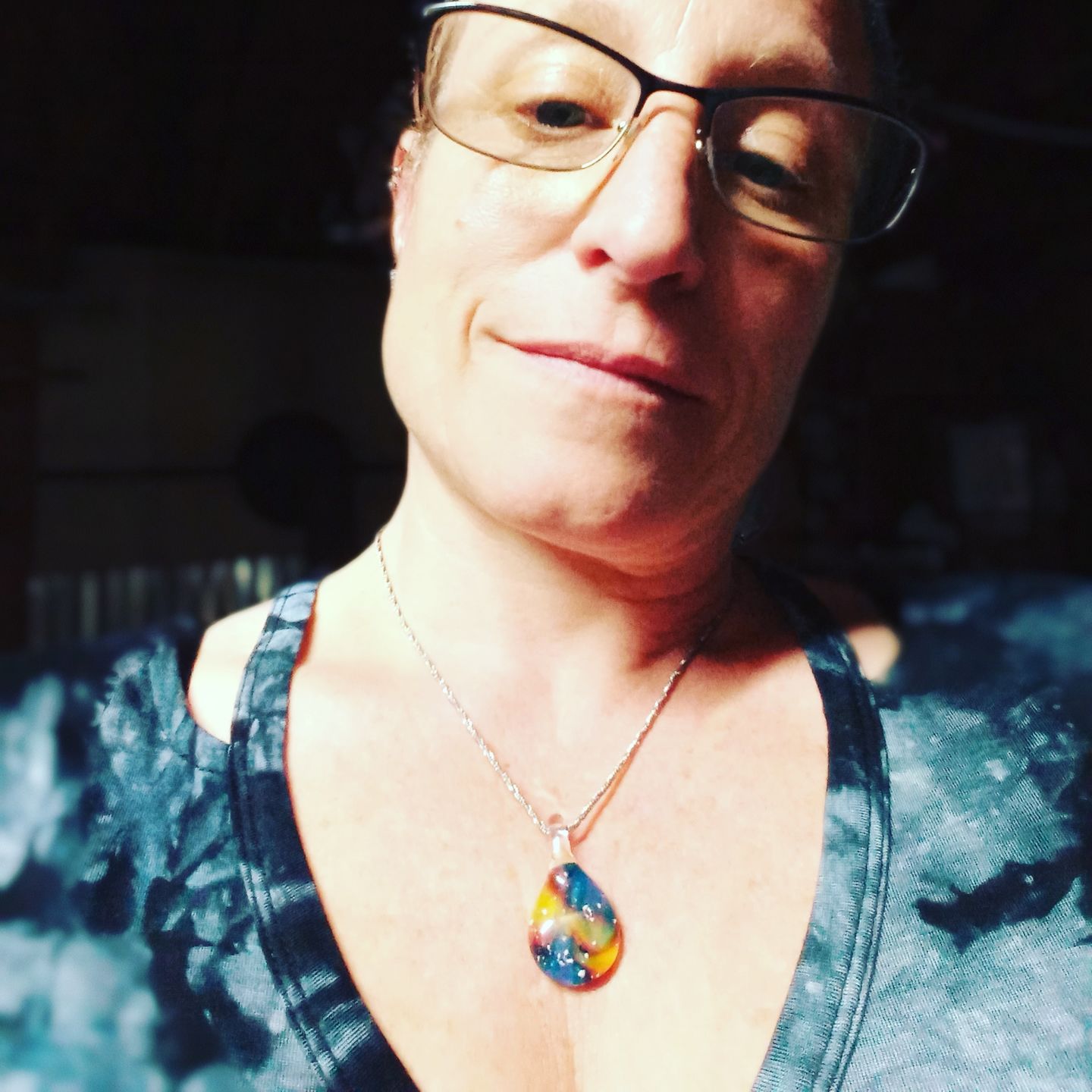 Customer photo review of Tie Dye Pendant with Infused Cremation Ashes