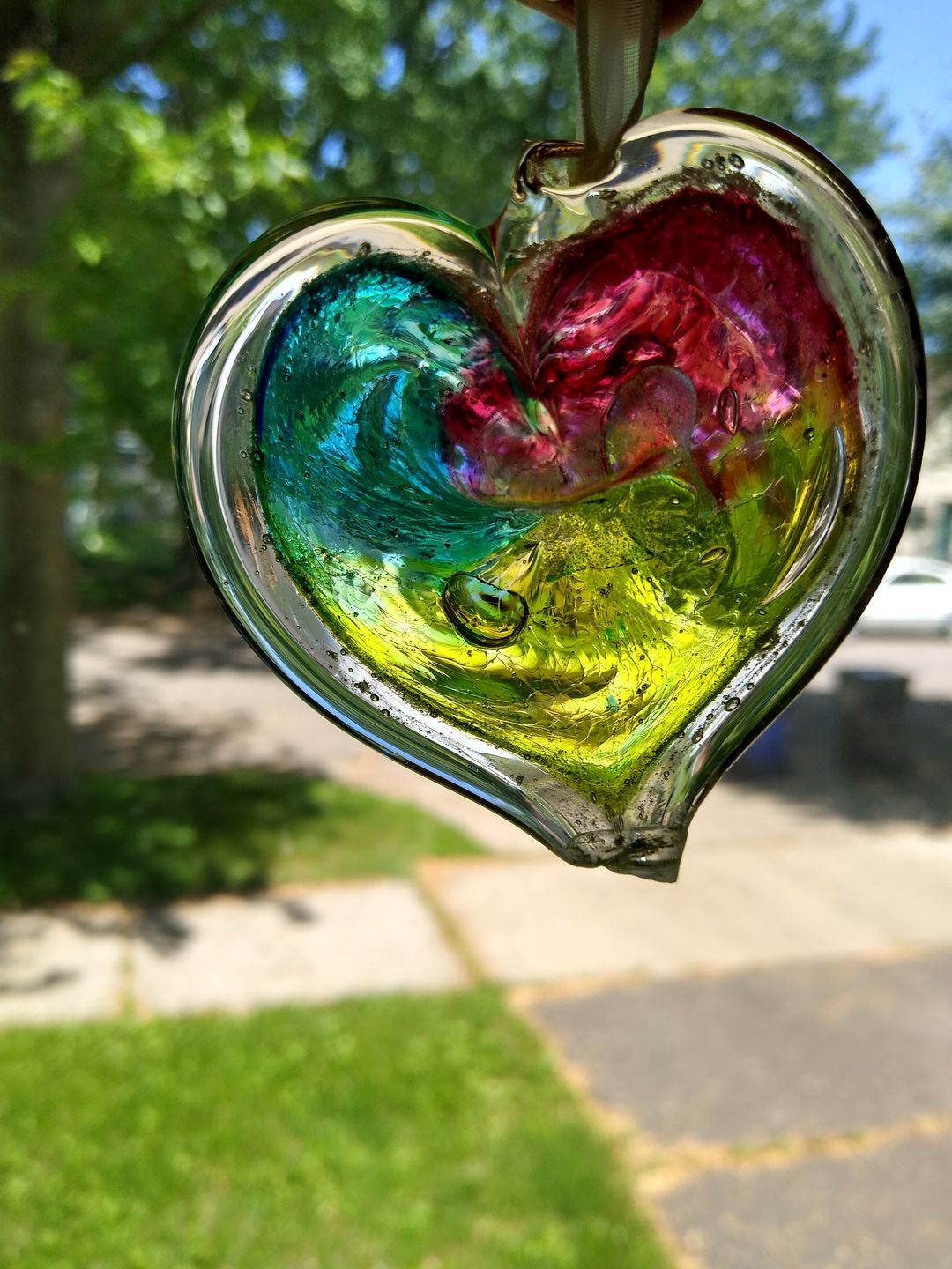 Customer photo review of Dichroic Heart Suncatcher with Infused Cremains