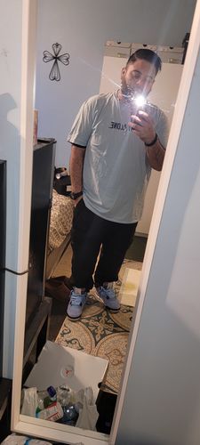 Customer photo review of Air Jordan 4 Retro 'University Blue'