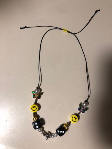 Customer photo review of Omirad Butterfly Skull Dice Pearl Smiley Necklace/Bracelet