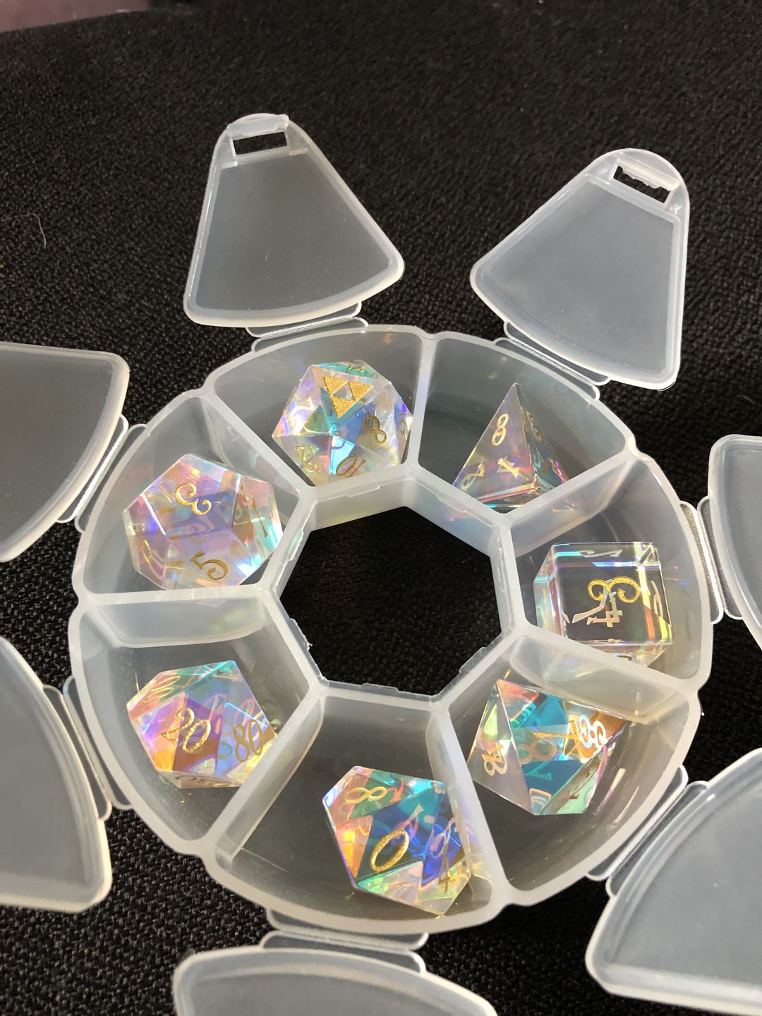 Customer photo review of URWizards Dnd Dichroic Prism Glass Gemstone Engraved Dice Set Triforce