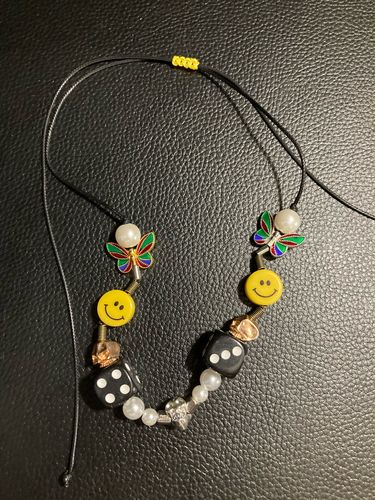 Customer photo review of Omirad Butterfly Skull Dice Pearl Smiley Necklace/Bracelet