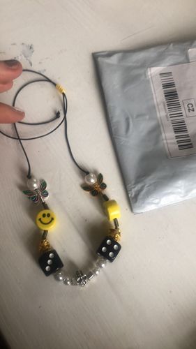 Customer photo review of Omirad Butterfly Skull Dice Pearl Smiley Necklace/Bracelet