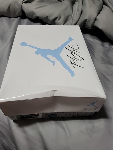 Customer photo review of Air Jordan 4 Retro 'University Blue'