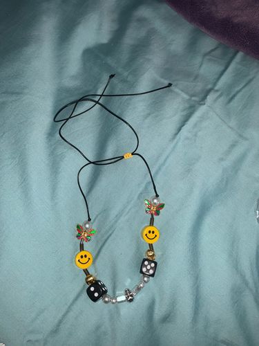 Customer photo review of Omirad Butterfly Skull Dice Pearl Smiley Necklace/Bracelet