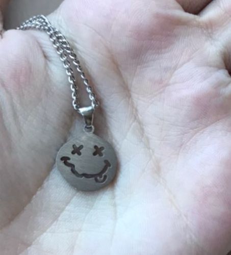 Customer photo review of Omirad Smiley Face Necklace