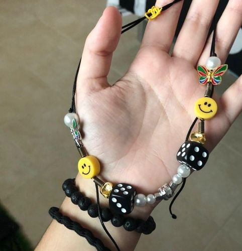 Customer photo review of Omirad Butterfly Skull Dice Pearl Smiley Necklace/Bracelet