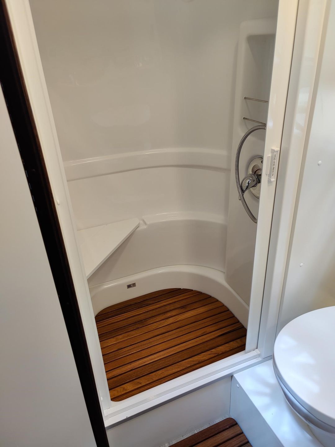 Customer photo review of 2021 and later Corner Bath Airstream Teak Shower Mat