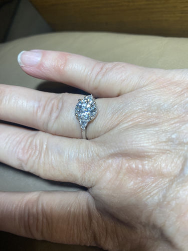Customer photo review of Three Stone Moissanite Two Tone Halo Sterling Silver Ring