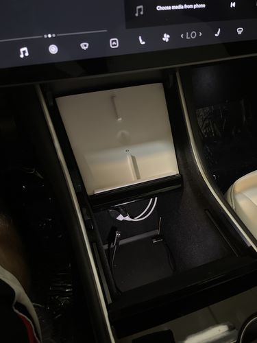 Customer photo review of Dual Wireless Phone Charger for Tesla Model 3