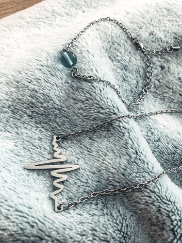 Customer photo review of Collier battement de cœur ou rythme cardiaque en acier chirurgical