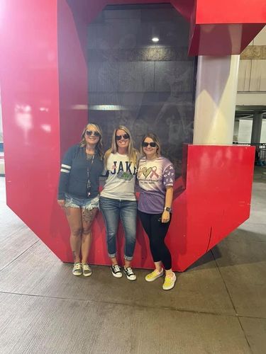 Customer photo review of Peace Love Cure Breast Cancer Print Sleeve Tee