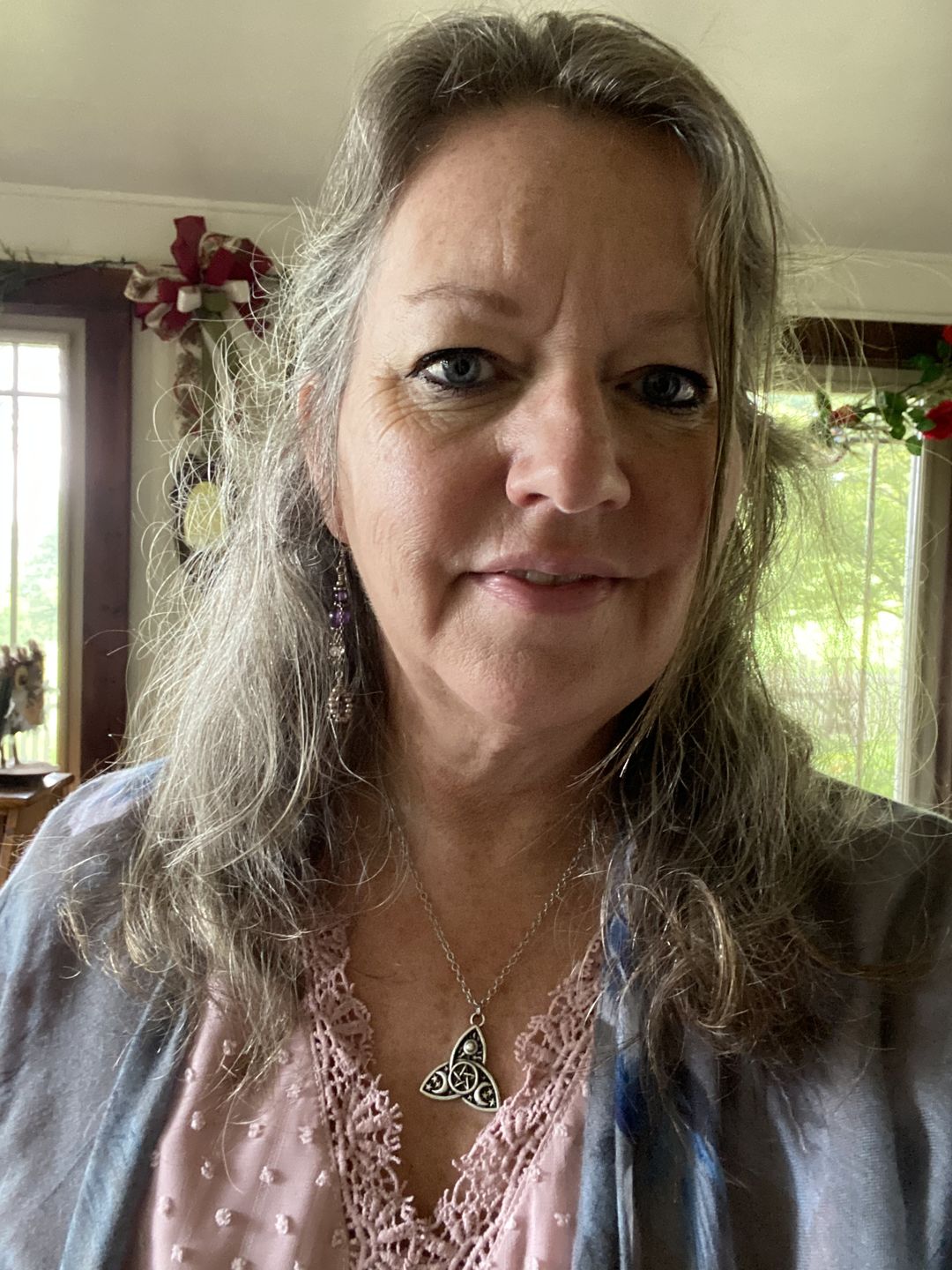 Customer photo review of Triple Moon Goddess Triquetra Necklace