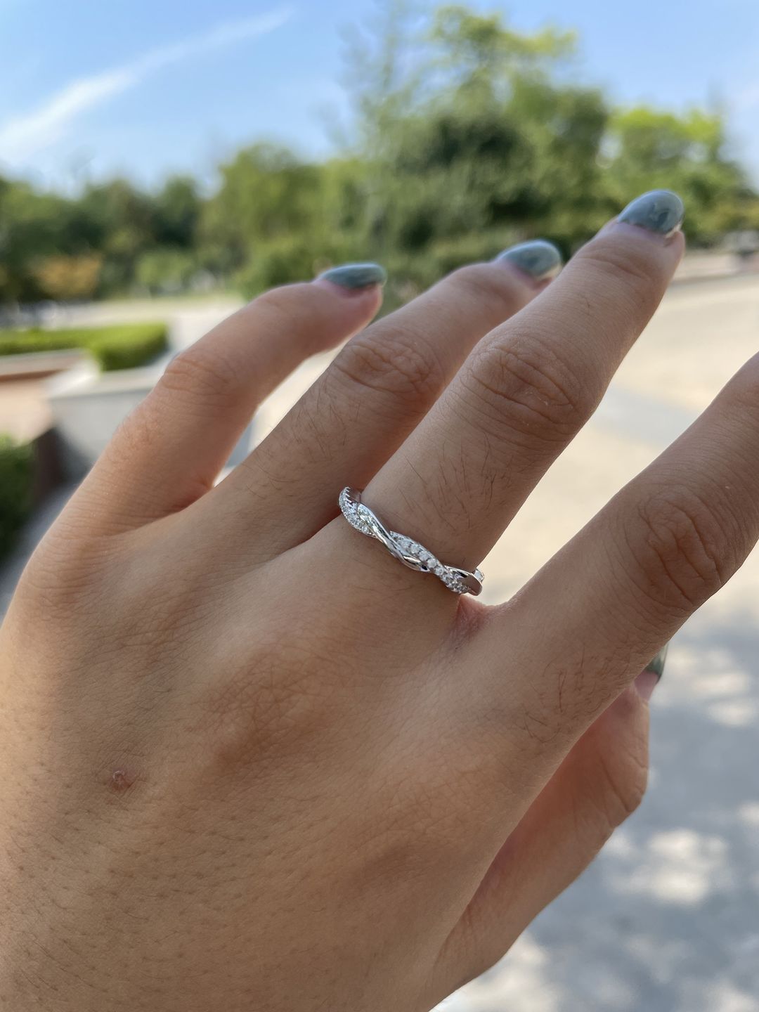 Customer photo review of Louily Twist Eternity Wedding Band for Women In Sterling Silver