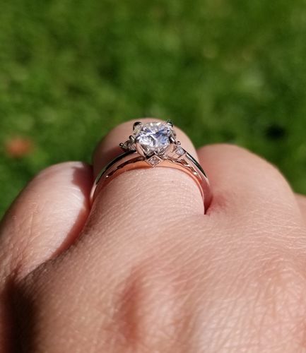 Customer photo review of Moissanite Three Stone Two Tone Sterling Silver Ring
