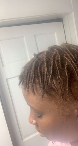 Customer photo review of Nourishing & Conditioning Hair Oil | 4 oz