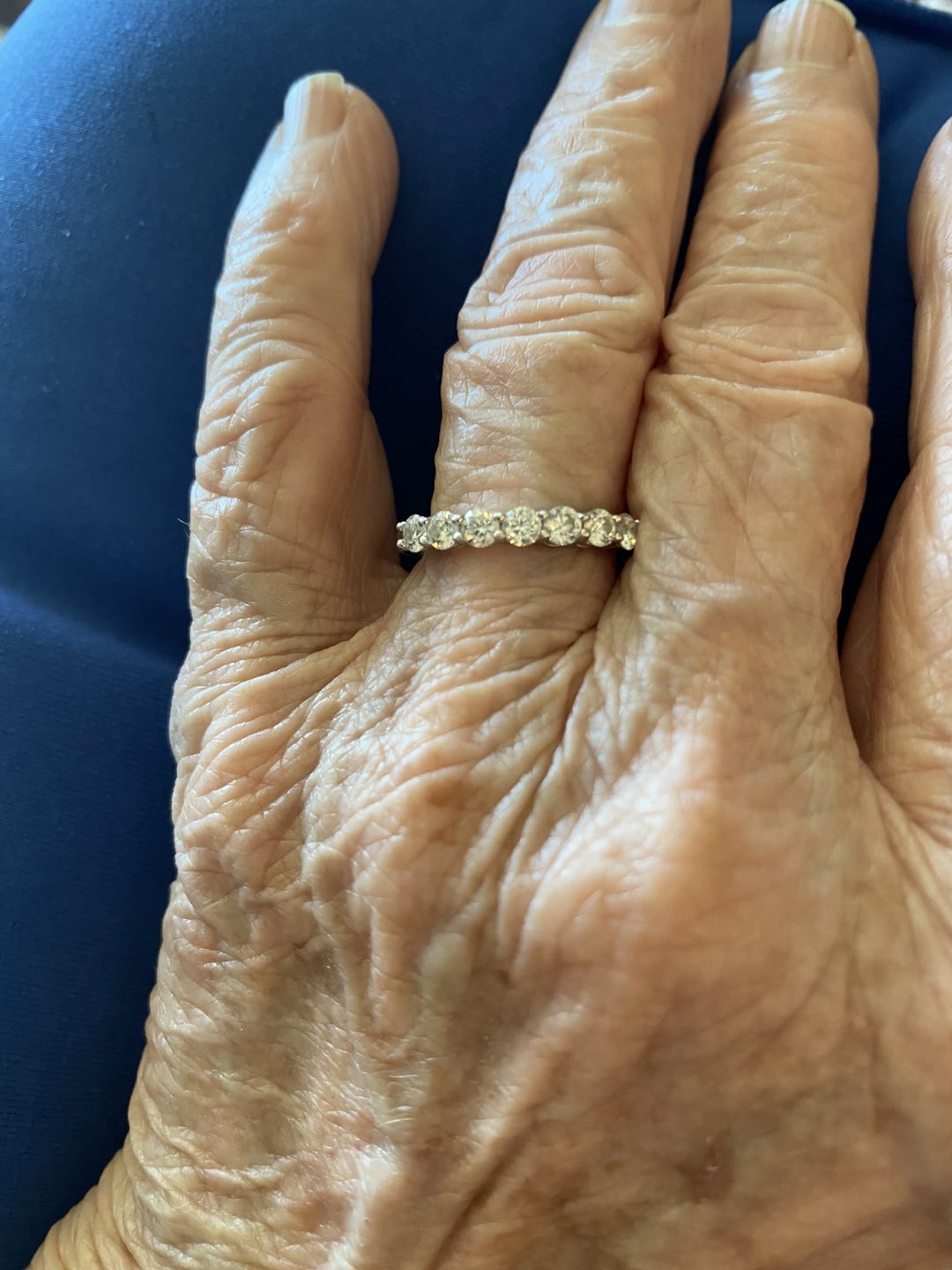 Customer photo review of Round Moissanite Sterling Silver Wedding Band Stackable Ring