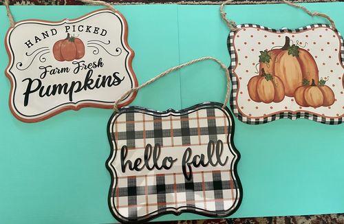 Customer photo review of Damaged 3 Asst 7"L X 6"H Fall Tin Sign Orange/Black/White AP1509
