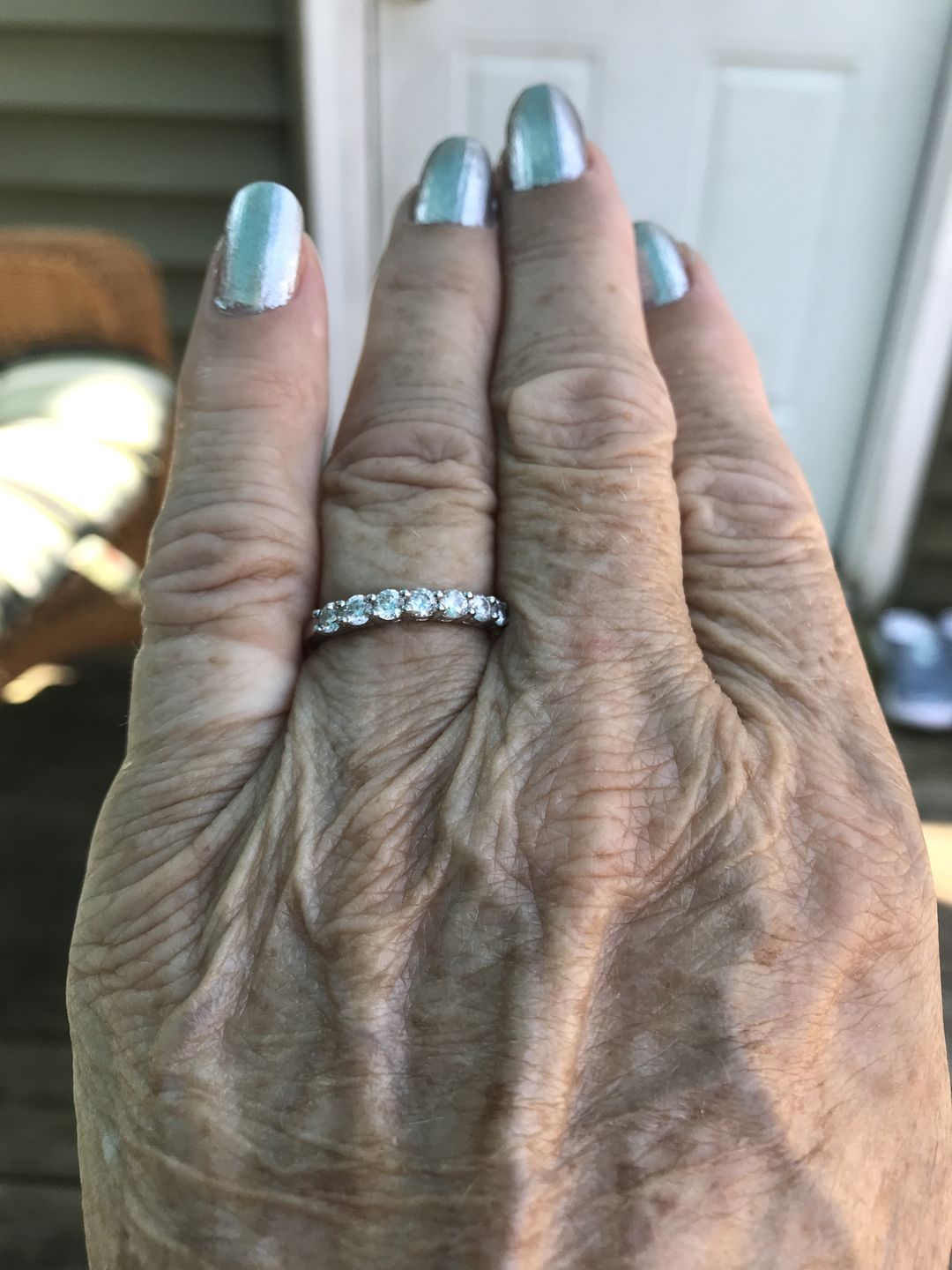 Customer photo review of Round Moissanite Sterling Silver Wedding Band Stackable Ring