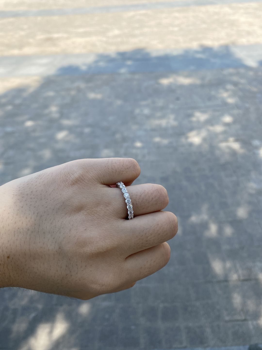 Customer photo review of Louily Eternity Round Cut Simulated Diamond Wedding Band In Sterling Silver