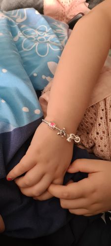 Customer photo review of Children's 'Fairytale Dreams' Pink Leather Charm Bead Bracelet