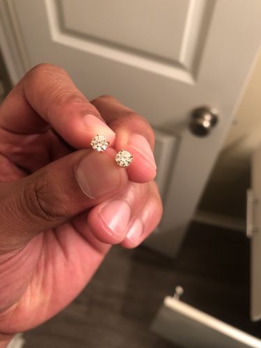 Customer photo review of VVS Moissanite Solitaire Stud Earrings