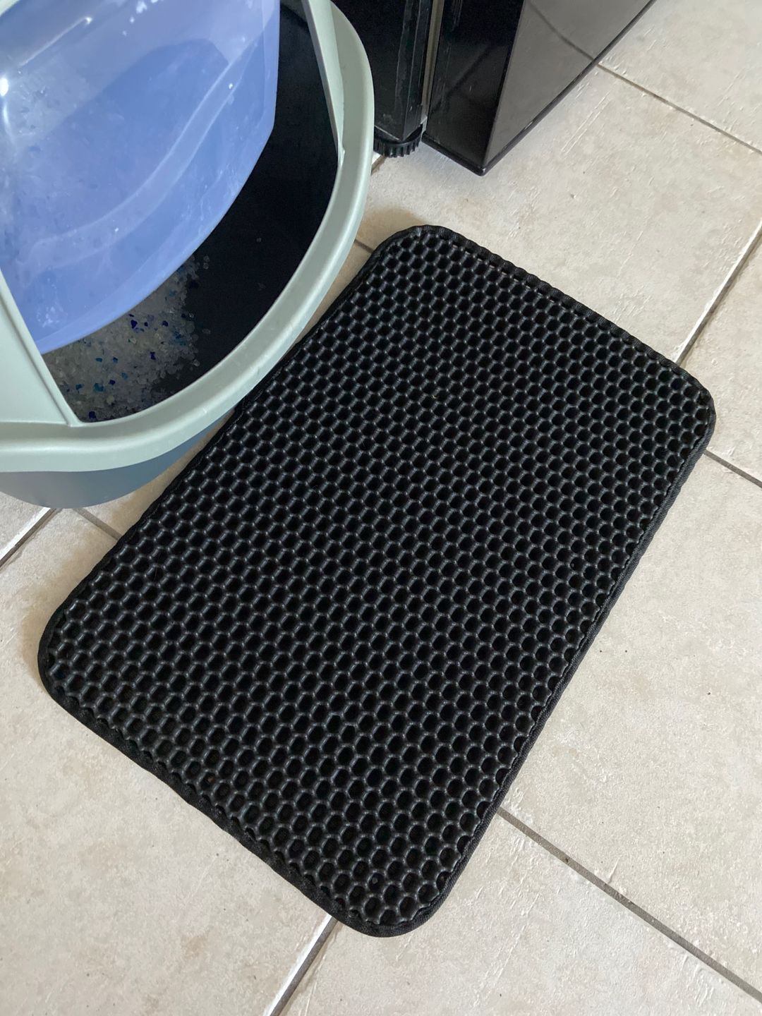 Customer photo review of Tapis de litière pour chat imperméable double couche facile à nettoyer