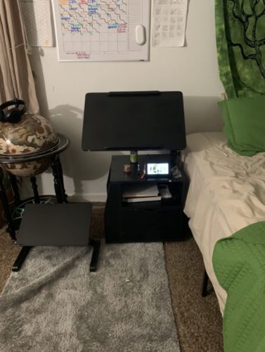 Customer photo review of Bedside Table Height Adjustable End Table,Wooden Nightstand with Swivel Top,Storage Drawers & Universal Wheels, Black