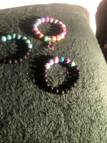 Customer photo review of 15.5" 6/8/10/12mm black Lava Round beads