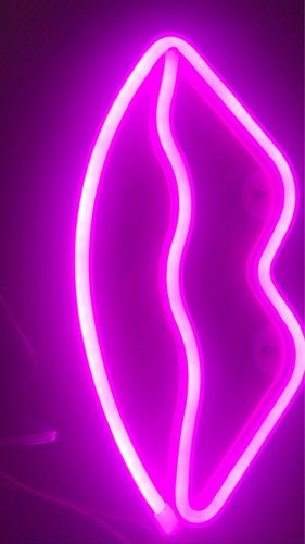 Customer photo review of 'There is a light that never goes out' neon sign