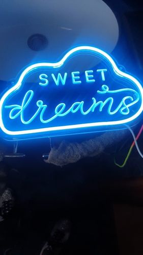 Customer photo review of 'There is a light that never goes out' neon sign
