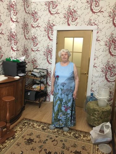 Customer photo review of Women Summer Crew Neck Floral Holiday Sleeveless Printed Dresses