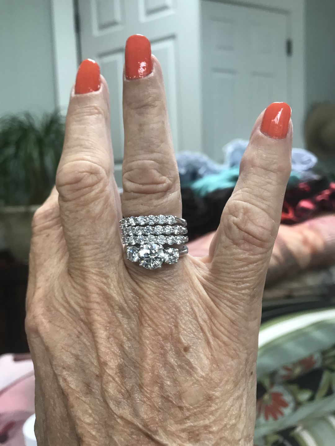 Customer photo review of Round Moissanite Sterling Silver Wedding Band Stackable Ring