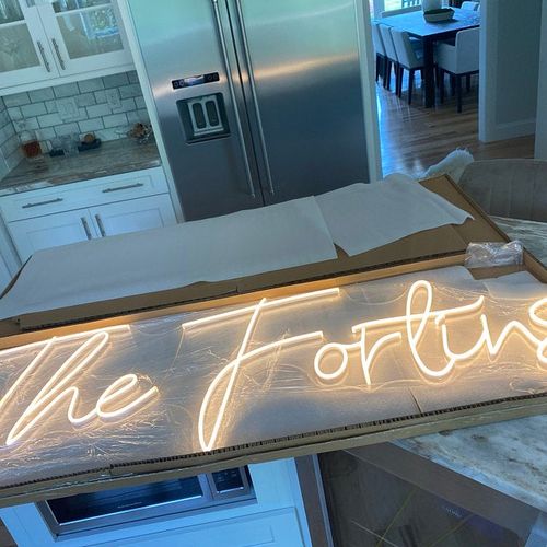 Customer photo review of 'There is a light that never goes out' neon sign