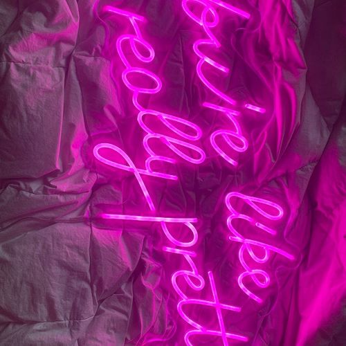 Customer photo review of 'There is a light that never goes out' neon sign