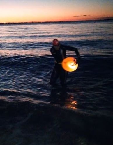 Customer photo review of Swim Safety Donut Tow Float & Dry Bag -  Mellow Yellow