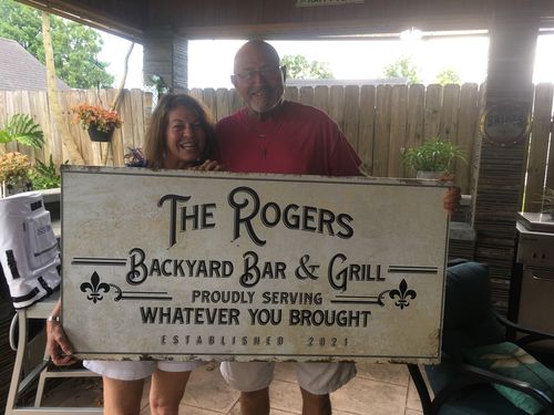 Customer photo review of Backyard Bar & Grill Sign