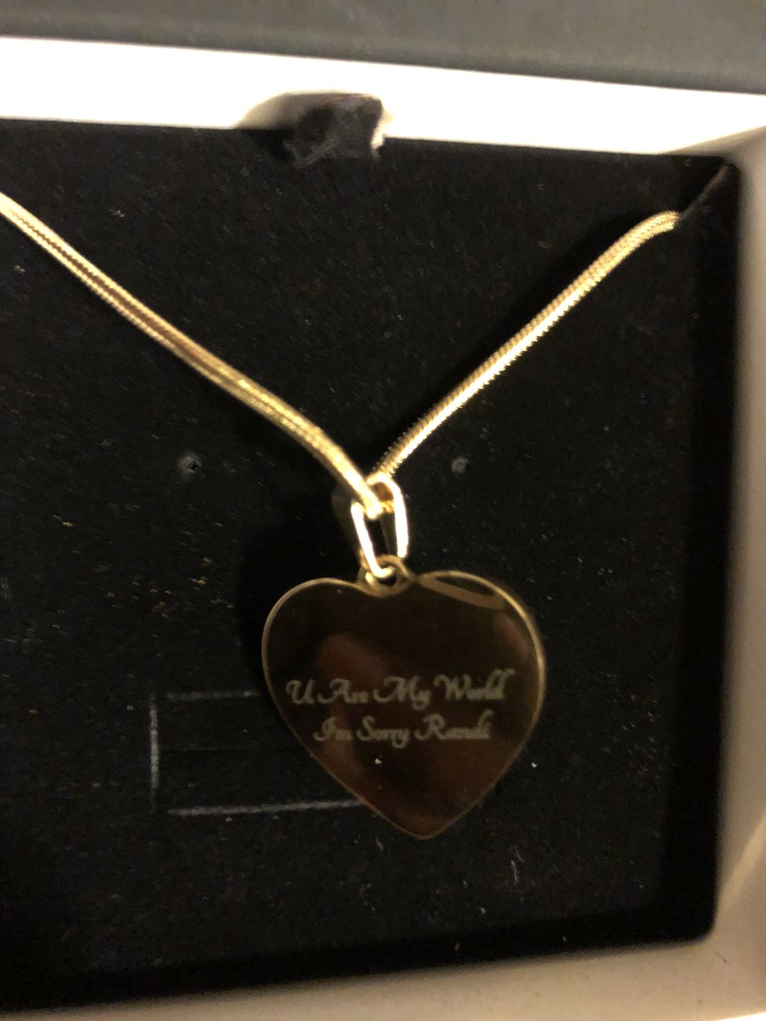 Customer photo review of In Loving Memory Heart Photo Necklace