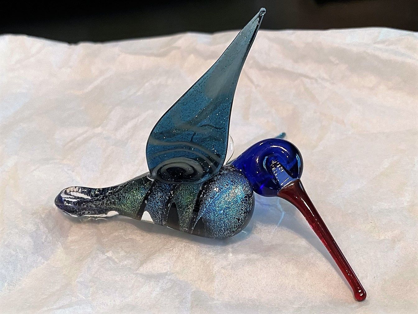 Customer photo review of Dichroic Twist Glass Hummingbird with Infused Ash