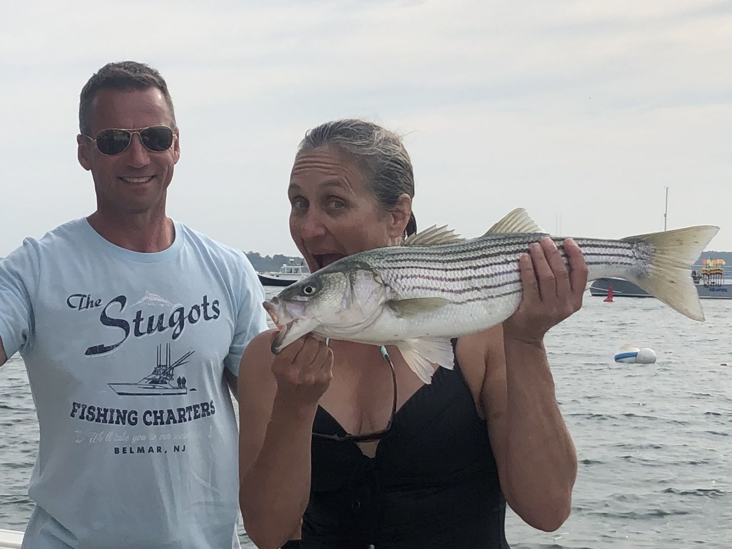 Customer photo review of The Stugots Fishing Charters Men's/Unisex Super Soft Tee