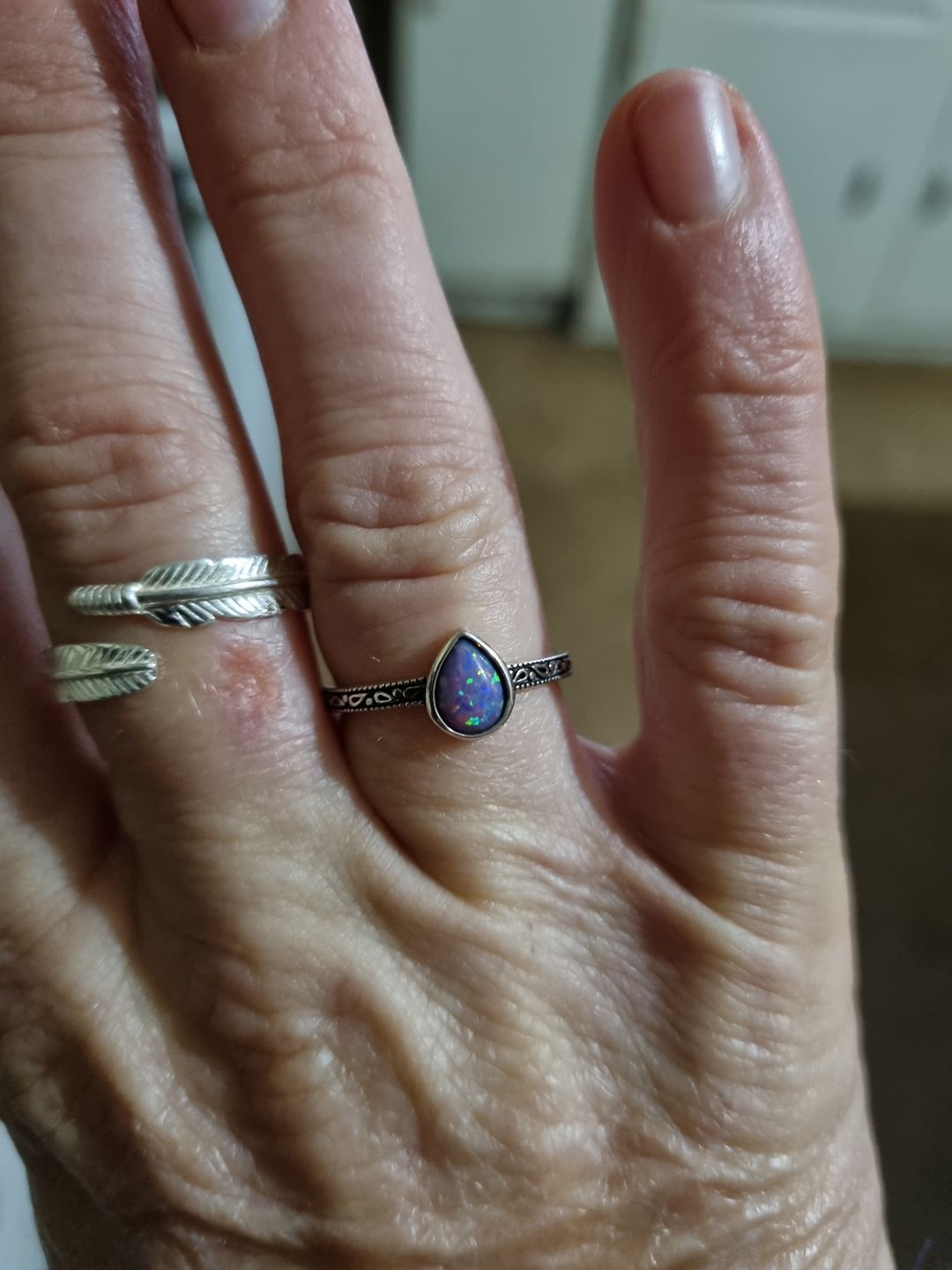 Customer photo review of Purple Tear Drop Opal Ring