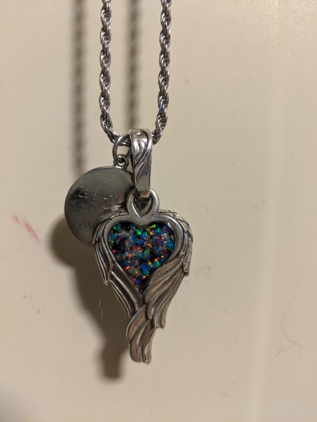 Customer photo review of Angel Wing Heart Pendant  - Engravable
