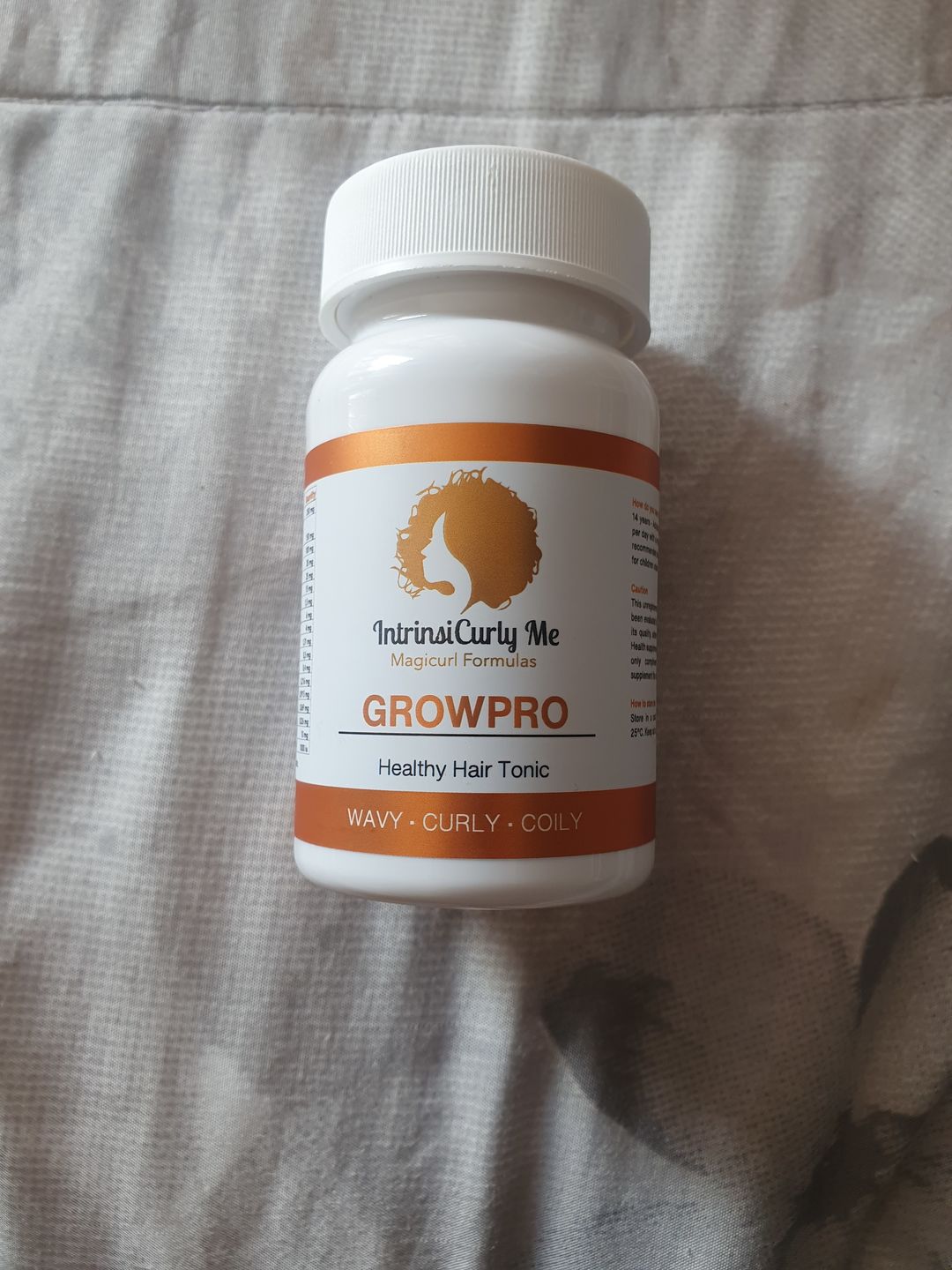 Customer photo review of GrowPro Healthy Hair Tonic